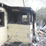 Fire in this part of the Merrianne Hall home at 827 Shoshone in Lovell prevented Merrianne Hall from exiting her house when fire broke out early Sunday morning. Sherry Snell