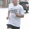 Kellen Winters runs on Main Street during the 5K division of the Club Dauntless Color Run Saturday morning. Winters easily won the race in a time of 14:55. David Peck