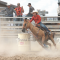 Kate Cooper races around the last barrel heading for the finish line. Avery Layne