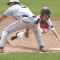 Lovell Mustang Aaiden Walker dives back into first base during a pickoff move in Lovell’s 8-3 game one win over the Riverton Raiders Saturday. The Mustangs face Wheatland today (Thursday) at 1 p.m. at the state tournament in Green River. David Peck