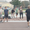The Rocky Mountain cross country team, (l-r) Avery Thomas, Zach Unruh, Derek Hedges, James Demers, Tristan Kerchner and Rowan Hanusa, listen attentively to last-minute instructions from Coach Jerry Burton (far right) before beginning an intense track workout earlier this week. Courtesy Photo 