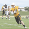 Rocky Mountain junior Ryan Grant turns upfield after catching a pass from quarterback Mason Moss during Rocky’s 51-0 zero-week win over Wright on Saturday. David Peck