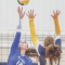 Lovell’s Celeste Lindsay sends the ball over the net as Greybull’s Marlee Henson attempts the block during Tuesday night’s game at Greybull High School. Lisa Kunkel