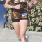 Rocky Mountain High School senior Avery Thomas accelerates toward the finish line on her way to a third-place finish in the girls’ race with a strong time of 21:32. Amy Hoyt