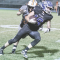 Lovell senior Joaquin Scheeler cuts up field for a gain during Lovell’s 23-7 win over the Casper Natrona JVs Thursday. Blocking at the right is Tazz McArthur. The Bulldogs open the playoffs at Big Horn Friday at 6 p.m. David Peck