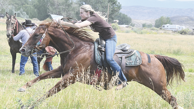 Expert rider Augastina Lembke dashes along the course during a race at the 2025 Crooked Creek Horse Races. This year’s event will take place August 7-9 at the site across the highway from the turnoff to Horseshoe Bend. David Peck