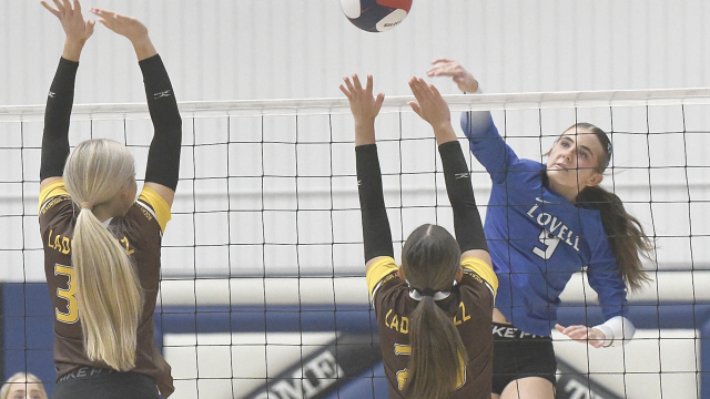 Avery Walker goes for the kill. Rocky’s Bailey Gifford and Leah Haslem attempt the block. David Peck Avery Walker goes for the kill. Rocky’s Bailey Gifford and Leah Haslem attempt the block. David Peck